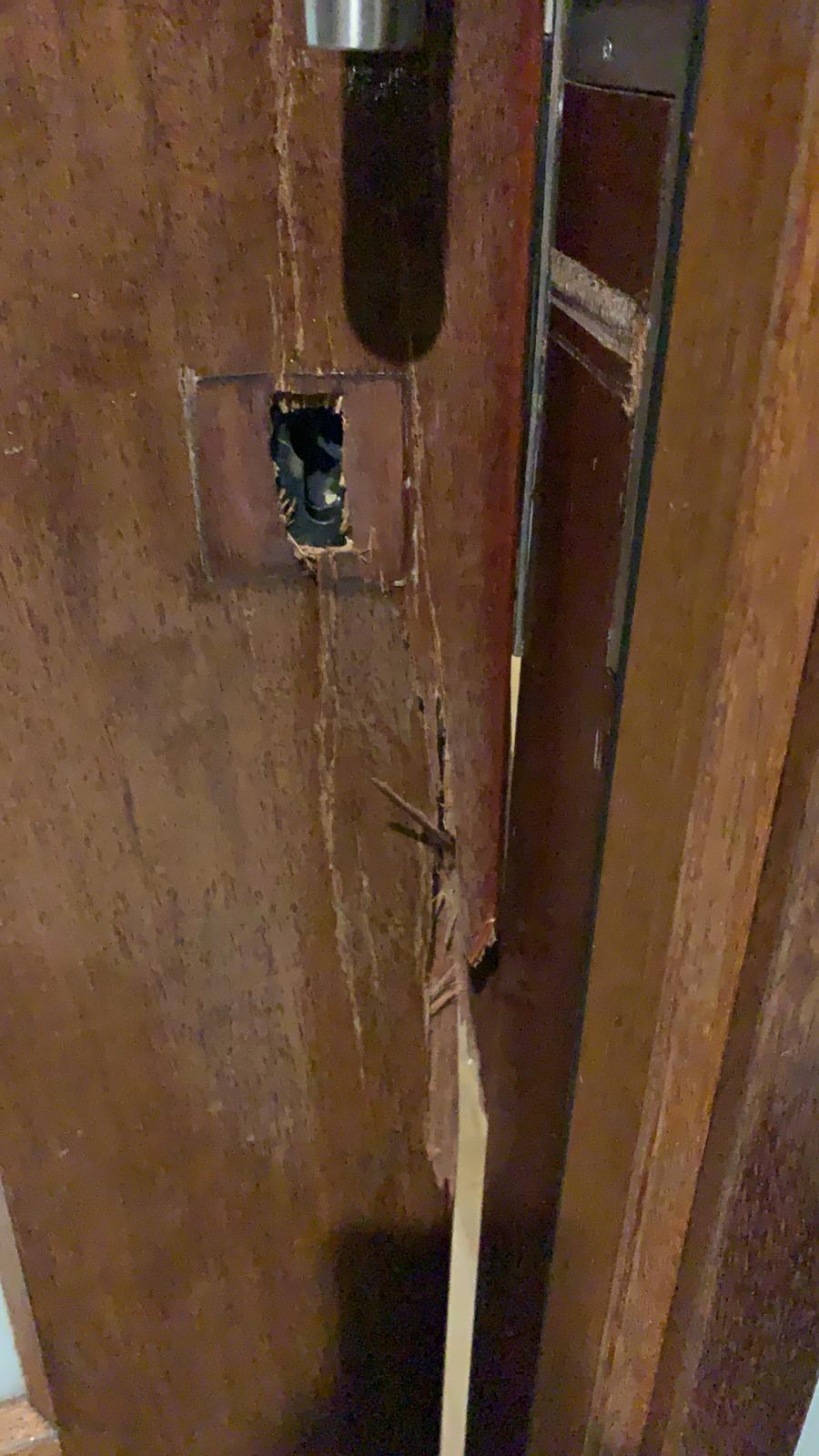 door broken into with lock removed